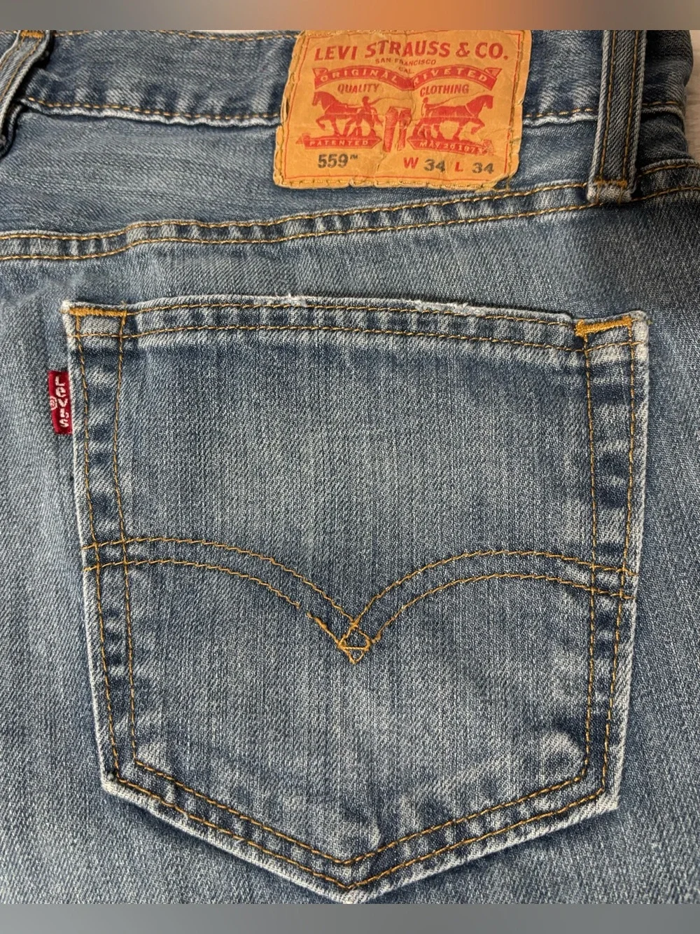 Men's LEVI #559 mid-wash blue denim jeans 34x34  GUC